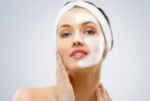 beauty women getting facial mask