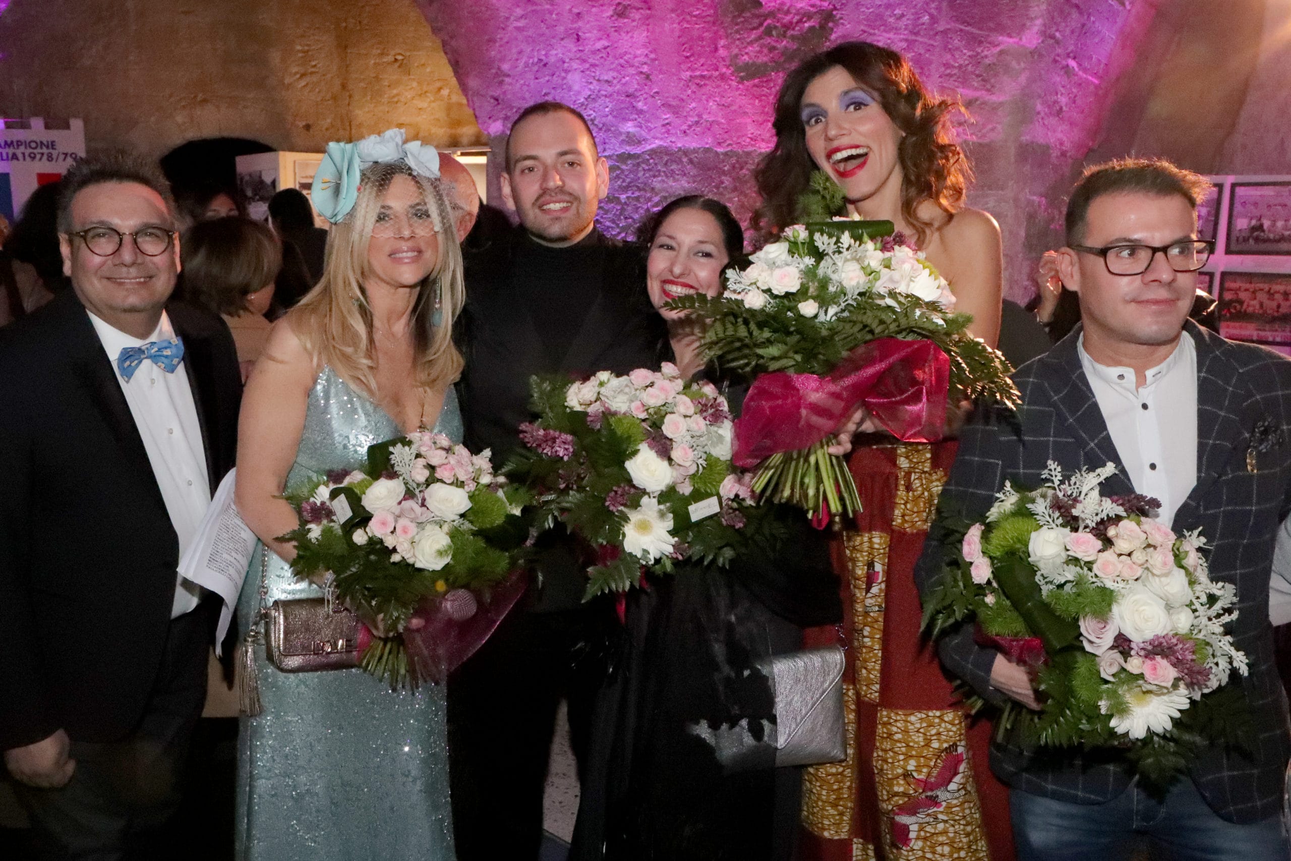 Vincenzo-Maiorano-Daniela-Mazzacane-Michele-Sgaramella-Nino-Armenise-con-una-modella